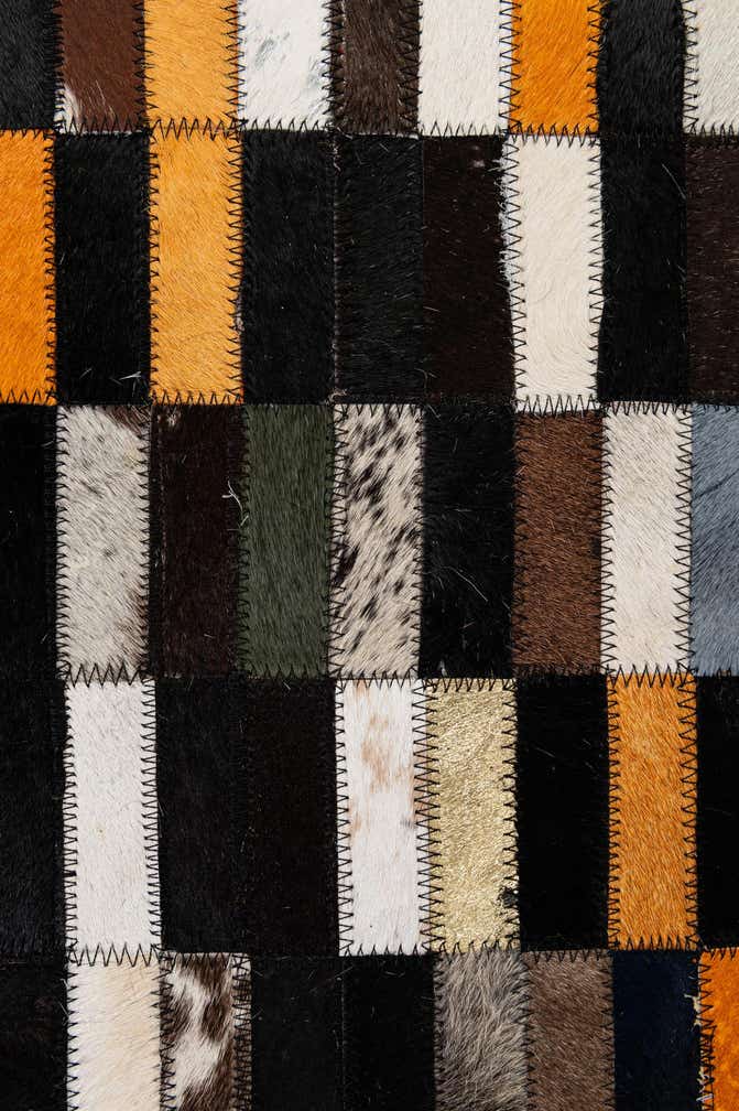 5' 3 x 8' 1 Cowhide - Patchwork Rug
