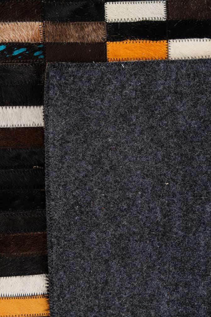 5' 3 x 8' 1 Cowhide - Patchwork Rug