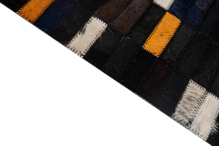 Detail image of 4' 11 x 8' Cowhide - Patchwork Rug