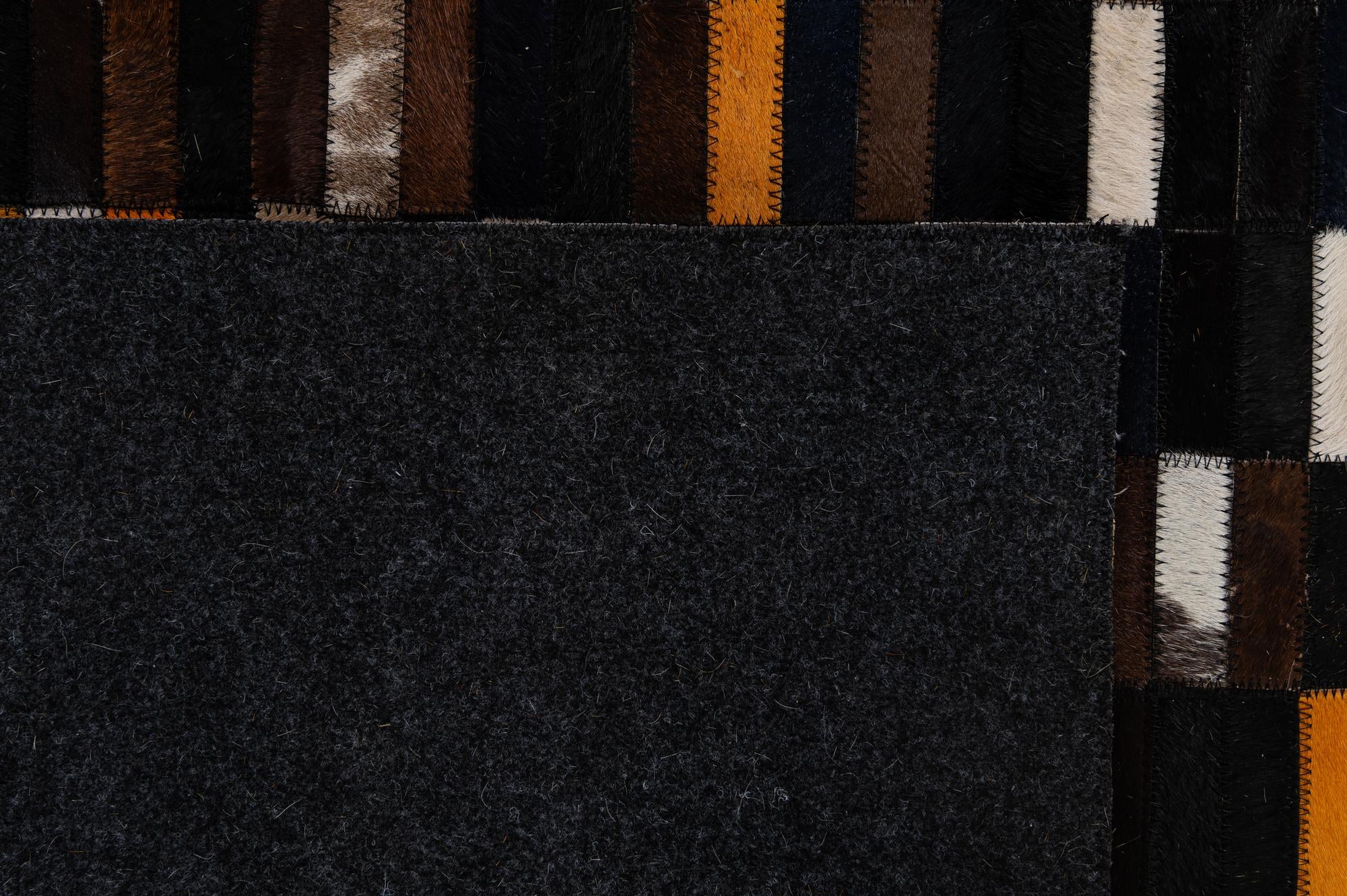 4' 11 x 8' Cowhide - Patchwork Rug