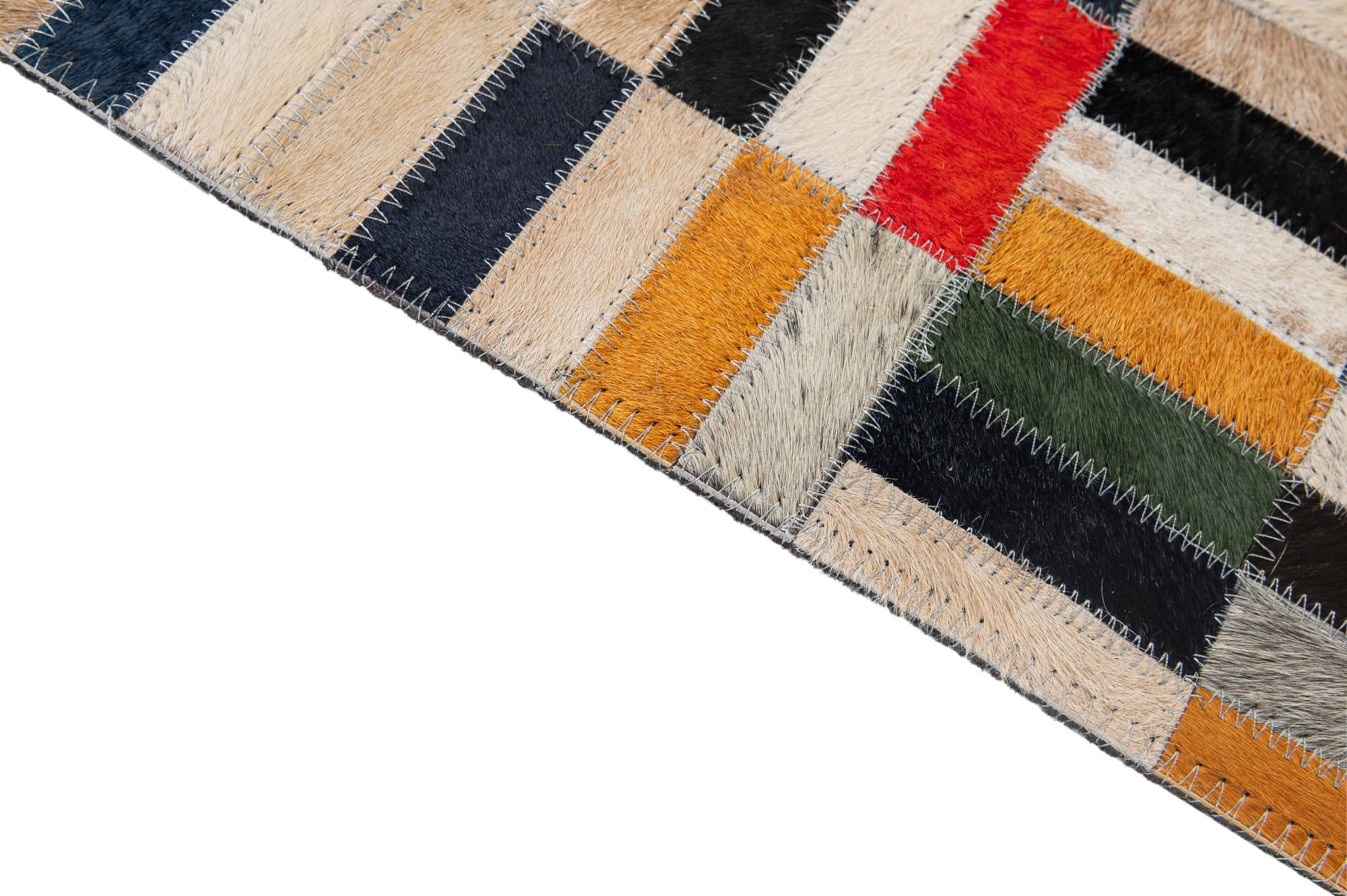 4' 11 x 7' 11 Cowhide - Patchwork Rug