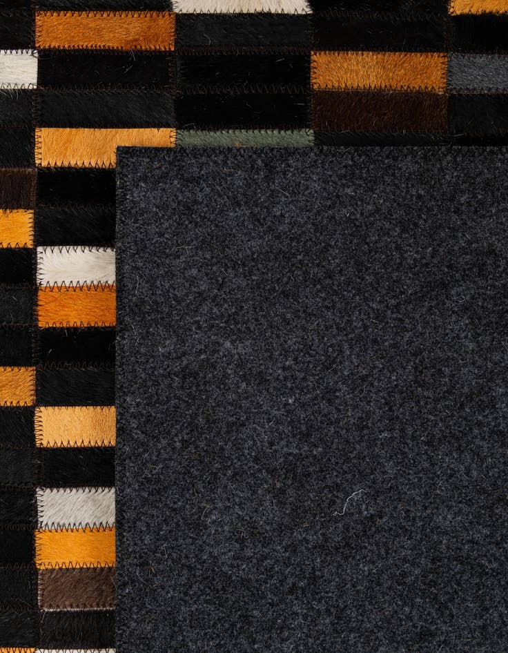Detail image of 5' 1 x 7' 11 Cowhide - Patchwork Rug