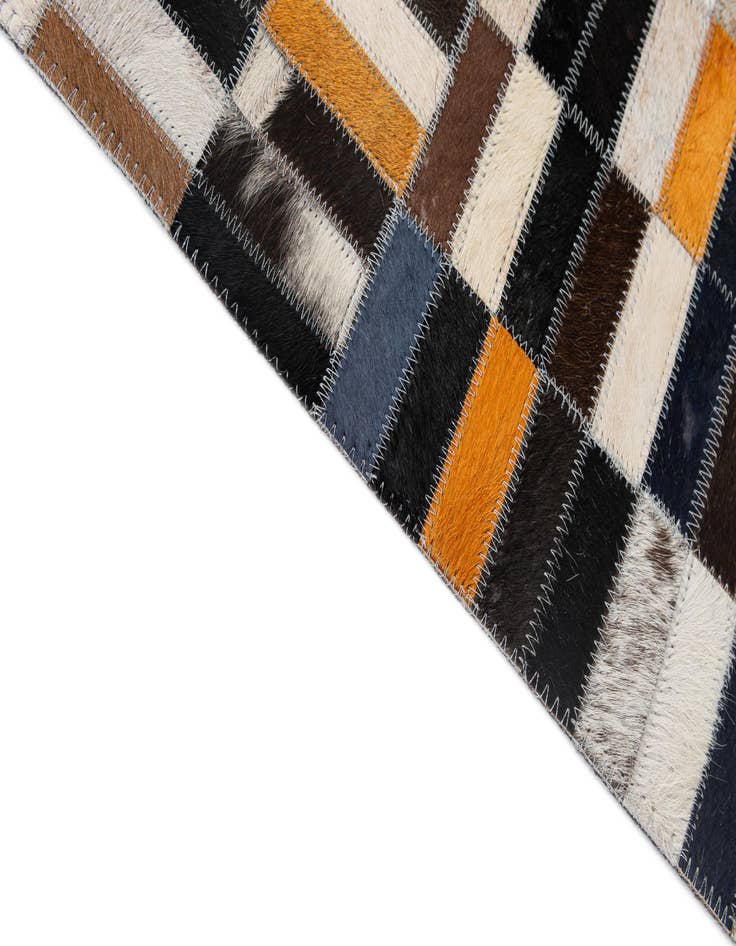 Detail image of 5' 1 x 8' 2 Cowhide - Patchwork Rug