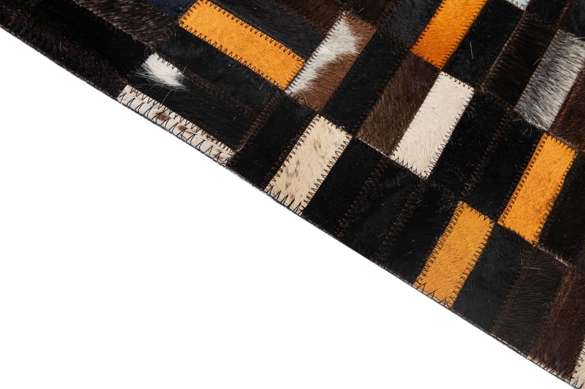 5' 1 x 8' 1 Cowhide - Patchwork Rug