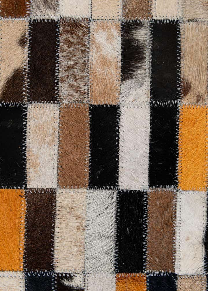5' 3 x 8' 1 Cowhide - Patchwork Rug