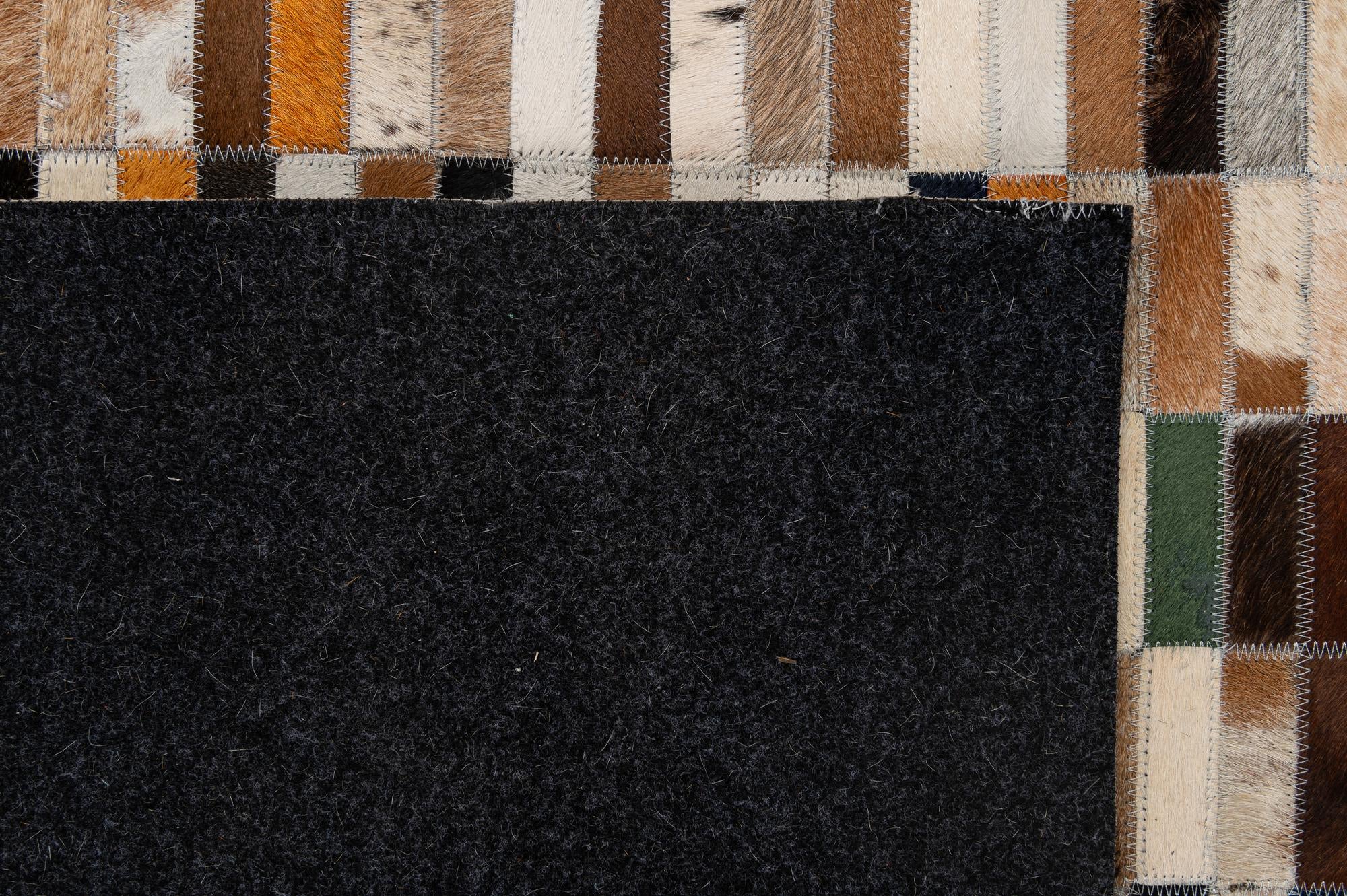 5' 3 x 8' 1 Cowhide - Patchwork Rug
