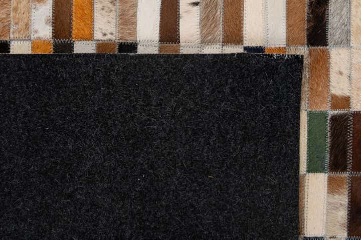 5' 3 x 8' 1 Cowhide - Patchwork Rug