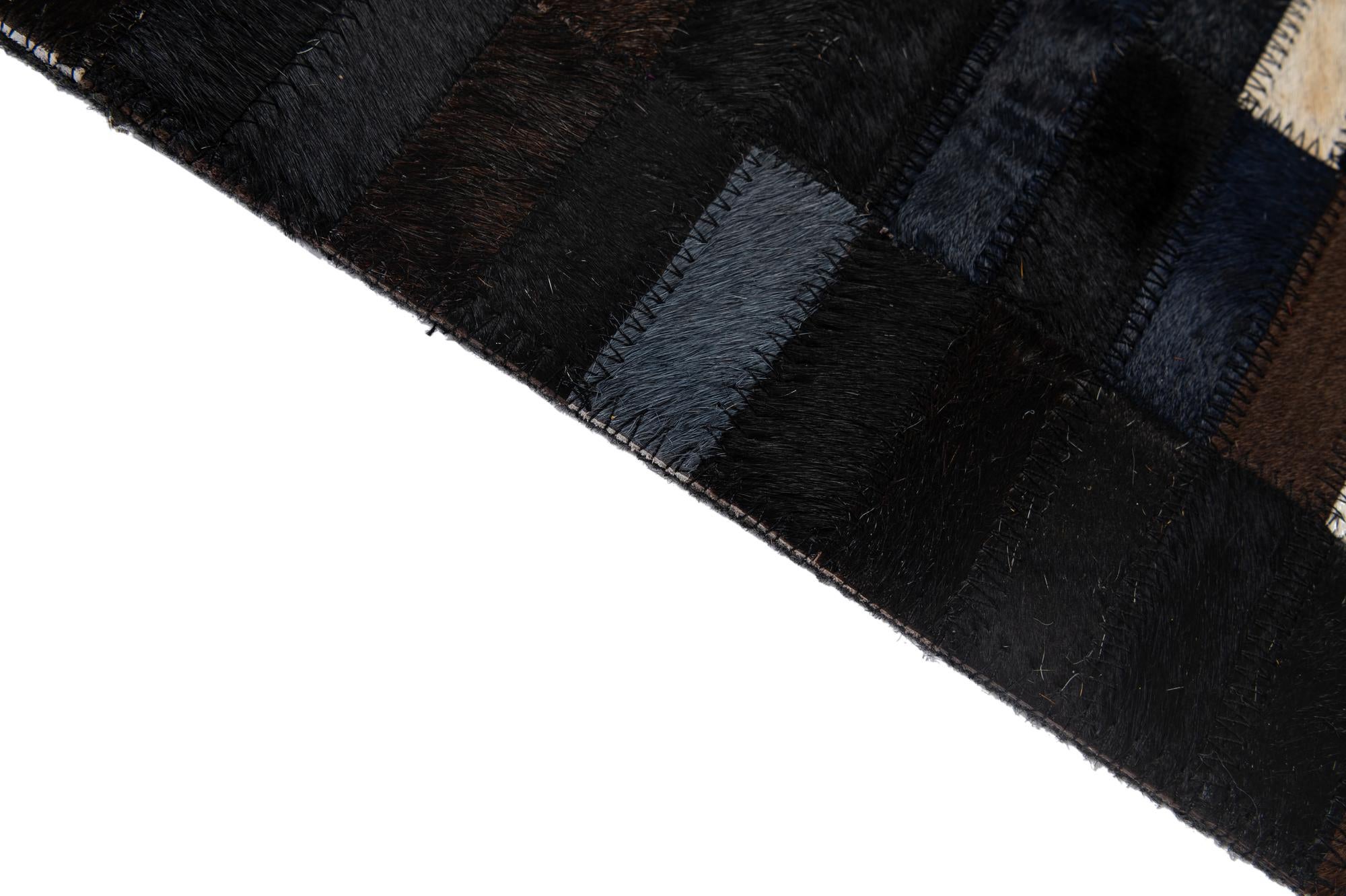 5' 3 x 7' 11 Cowhide - Patchwork Rug