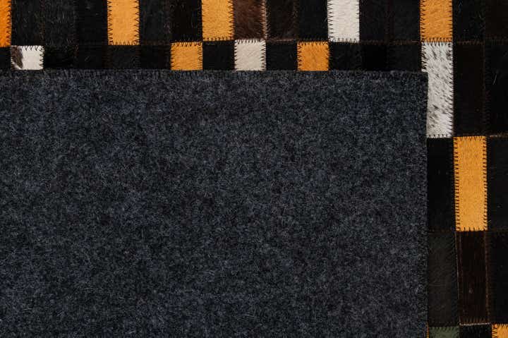 5' 2 x 8' 1 Cowhide - Patchwork Rug