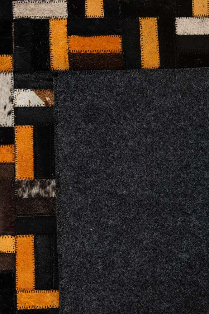5' 1 x 7' 11 Cowhide - Patchwork Rug
