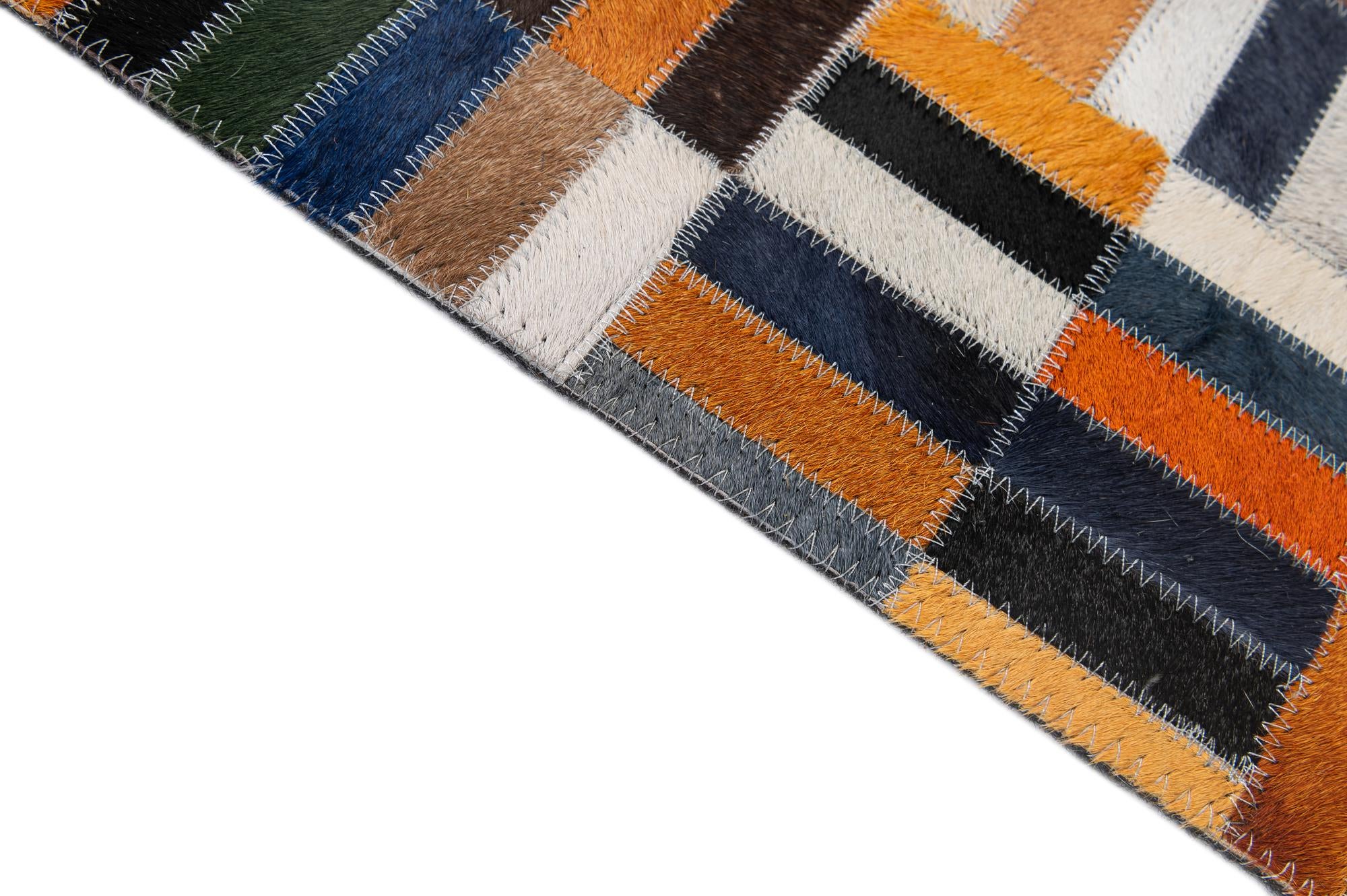 5' 2 x 8' 1 Cowhide - Patchwork Rug