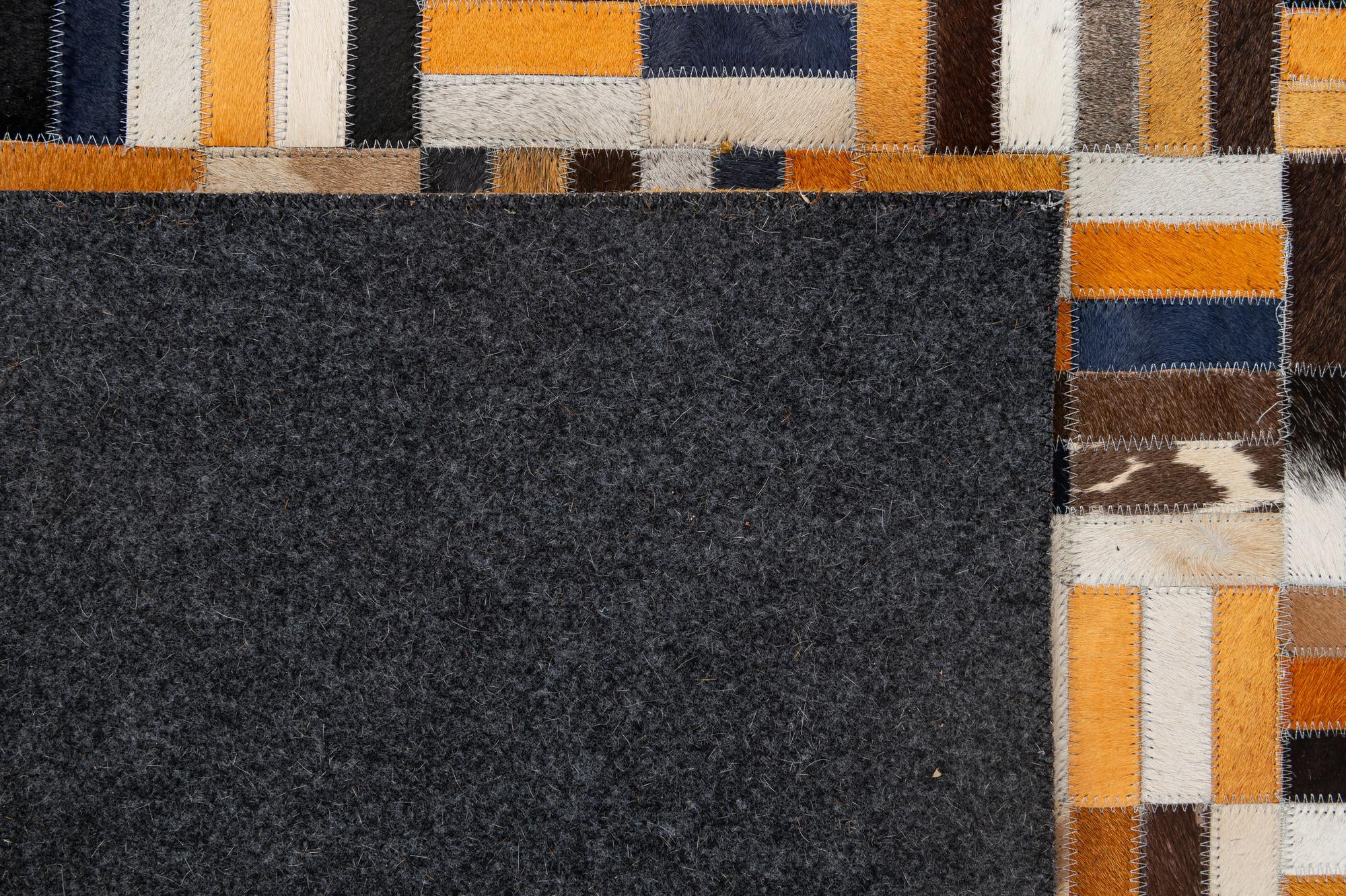 5' 2 x 8' 1 Cowhide - Patchwork Rug