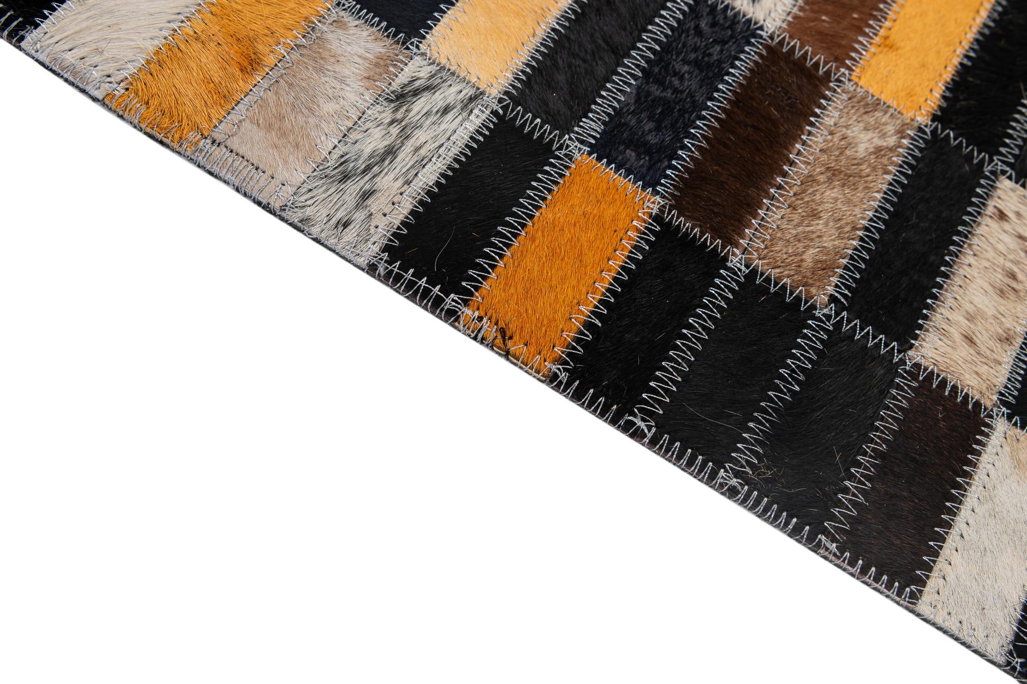 4' 11 x 7' 11 Cowhide - Patchwork Rug