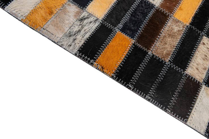 Detail image of 4' 11 x 7' 11 Cowhide - Patchwork Rug