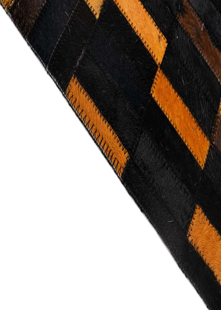 5' 2 x 8' 1 Cowhide - Patchwork Rug