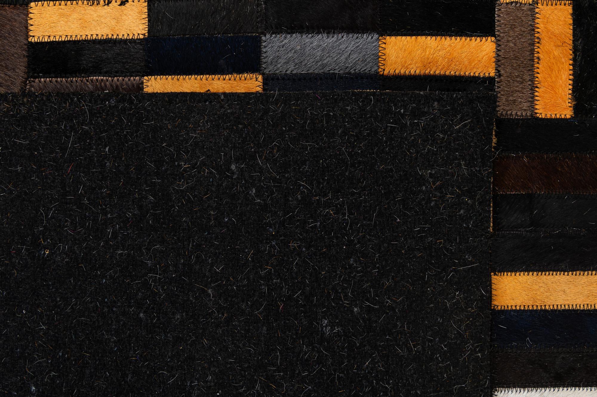 5' 2 x 8' 1 Cowhide - Patchwork Rug