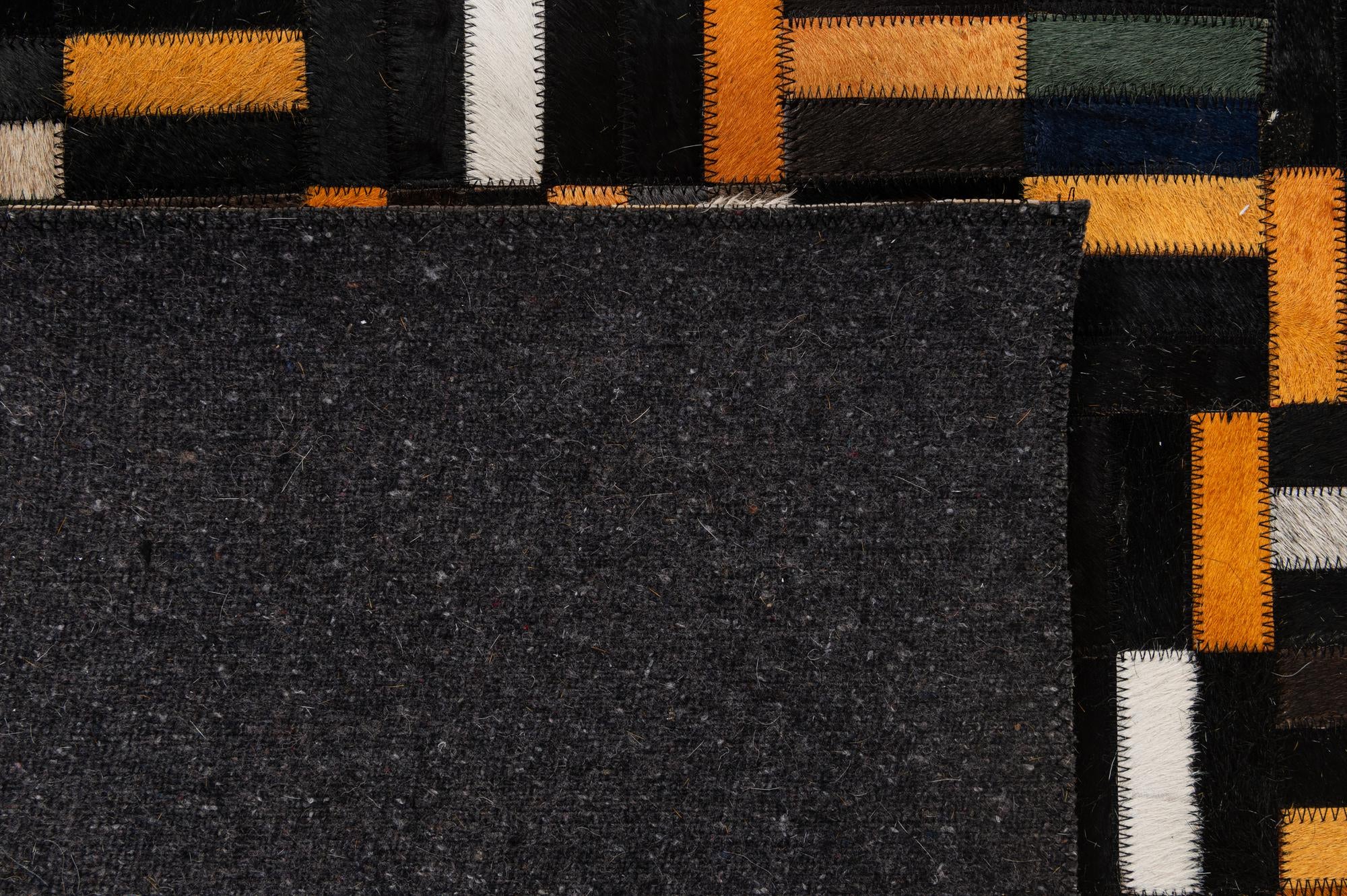 5' 2 x 8' 1 Cowhide - Patchwork Rug