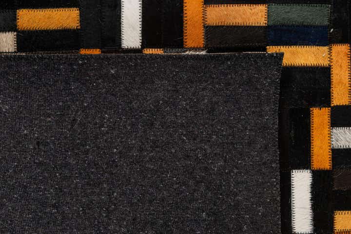 5' 2 x 8' 1 Cowhide - Patchwork Rug