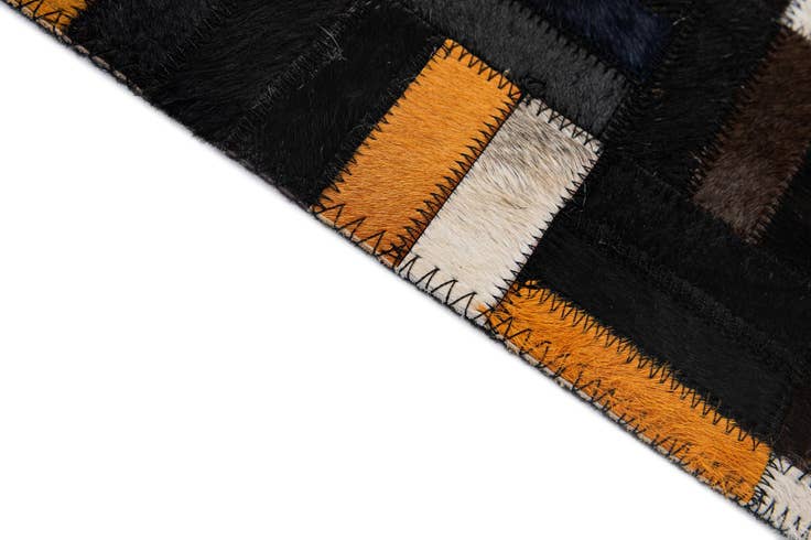 Detail image of 5' 1 x 8' 2 Cowhide - Patchwork Rug