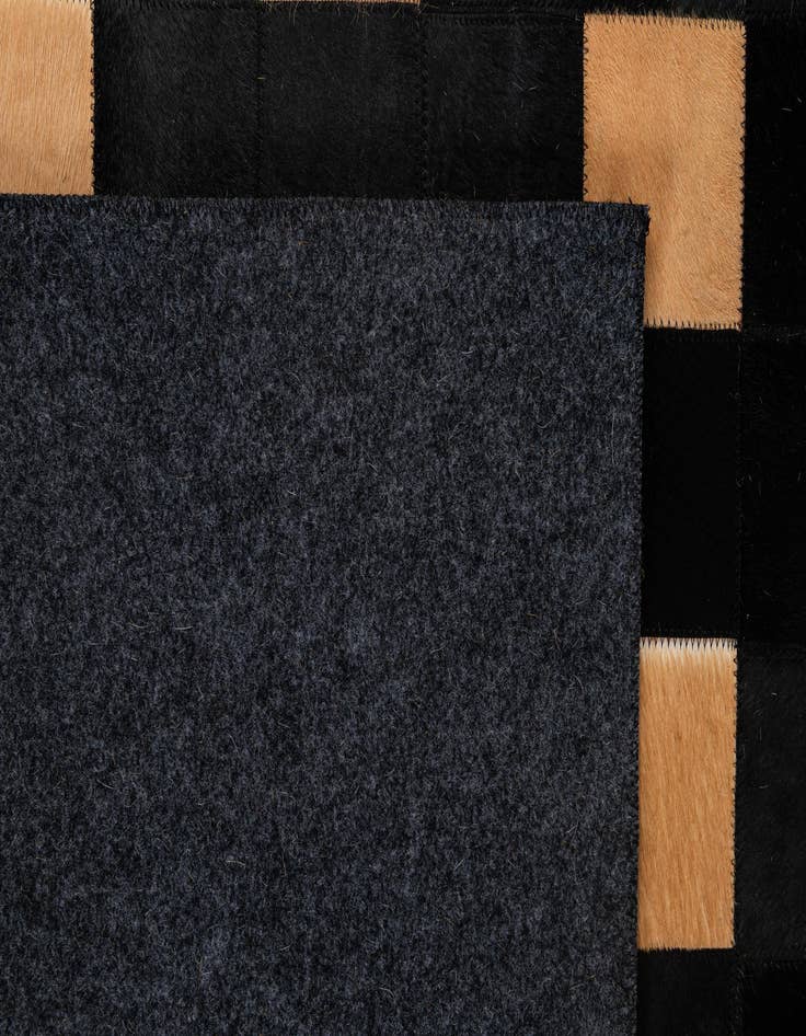 Detail image of 5' x 7' 11 Cowhide - Patchwork Rug