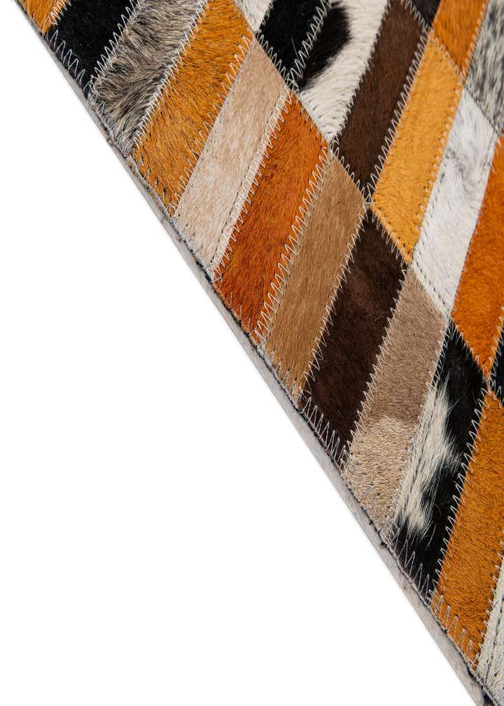 4' 11 x 7' 9 Cowhide - Patchwork Rug