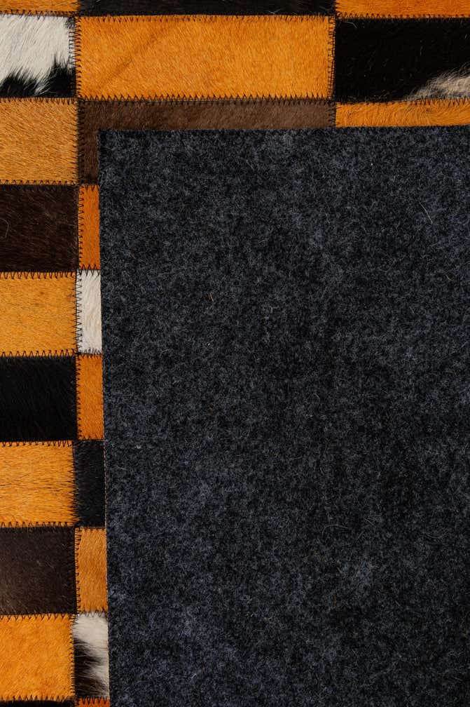 5' 1 x 7' 11 Cowhide - Patchwork Rug