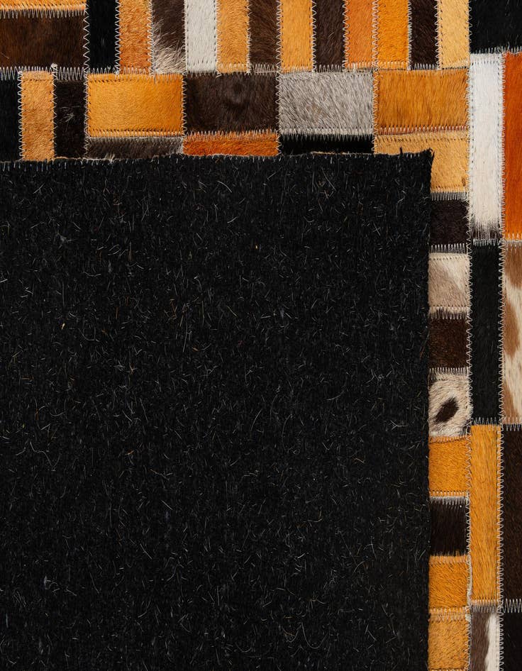 Detail image of 4' 11 x 7' 11 Cowhide - Patchwork Rug
