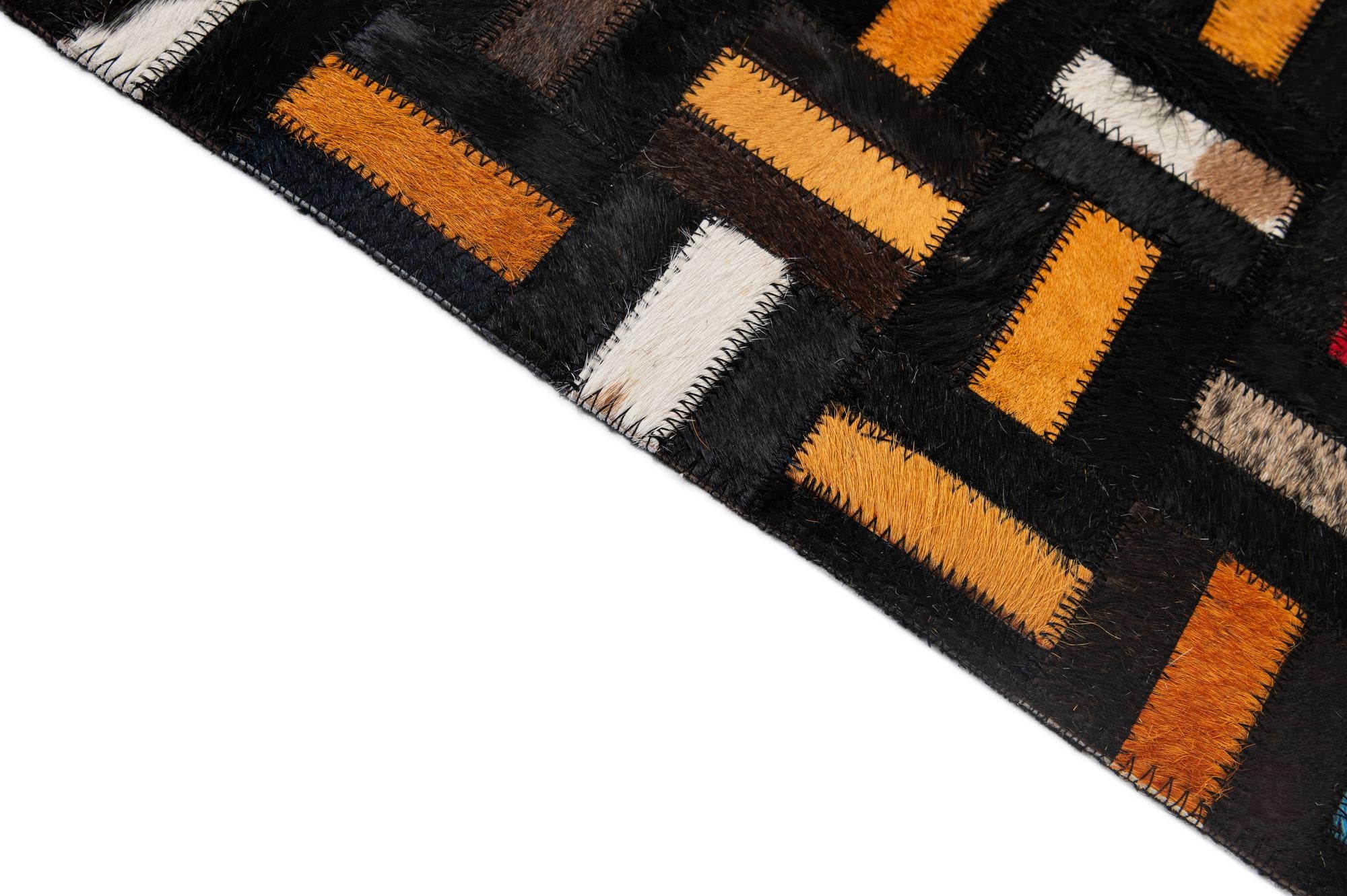 4' 11 x 7' 10 Cowhide - Patchwork Rug