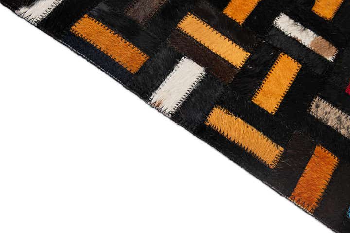 4' 11 x 7' 10 Cowhide - Patchwork Rug