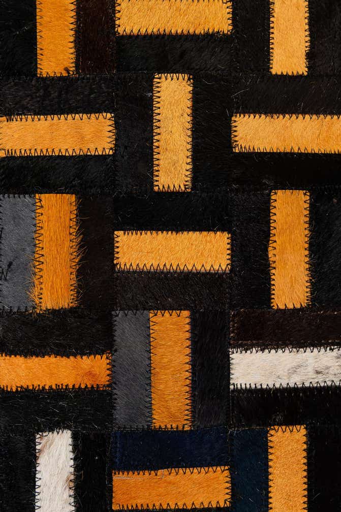 4' 11 x 7' 10 Cowhide - Patchwork Rug