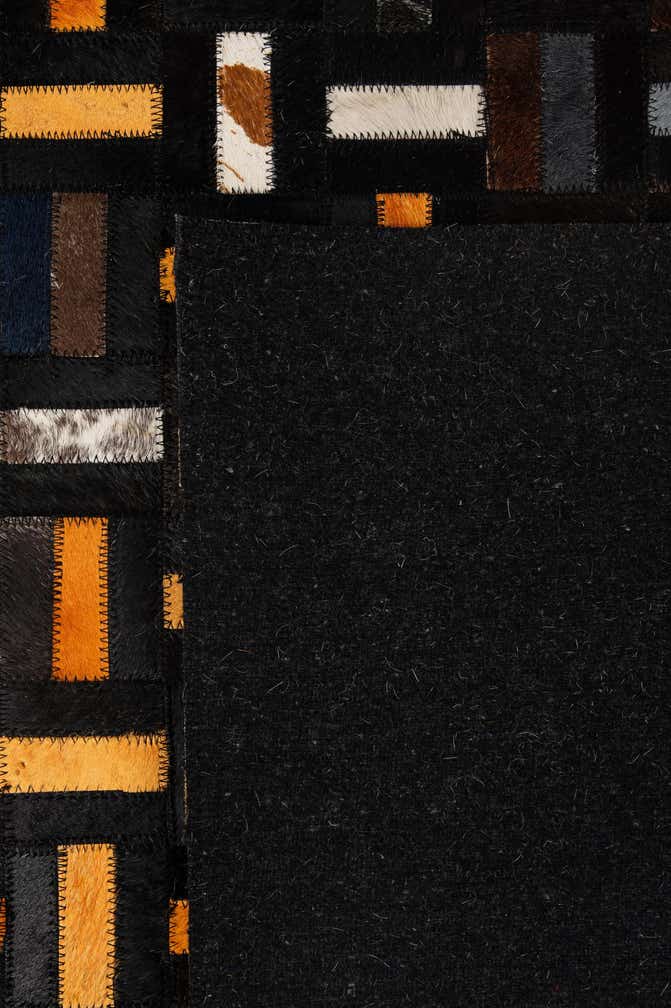 4' 11 x 7' 10 Cowhide - Patchwork Rug