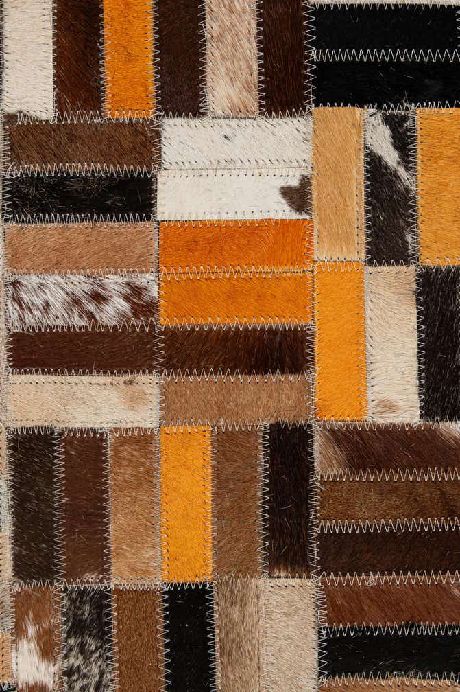 5' x 7' 11 Cowhide - Patchwork Rug