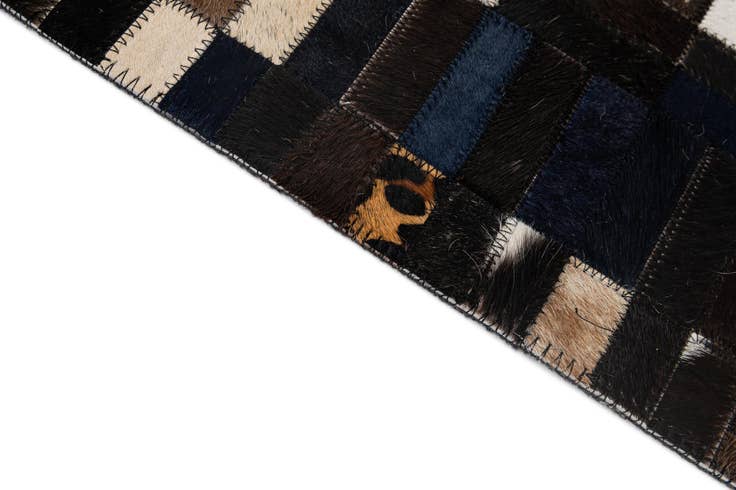Detail image of 5' 1 x 8' Cowhide - Patchwork Rug