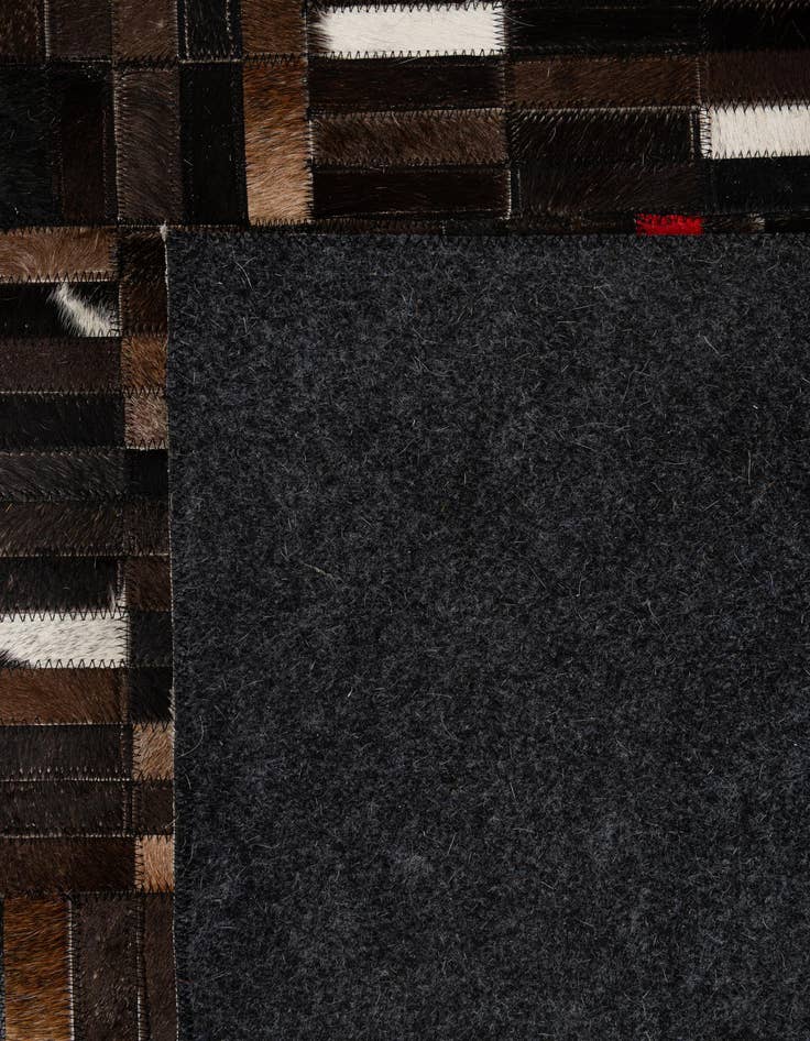 Detail image of 5' 1 x 8' Cowhide - Patchwork Rug