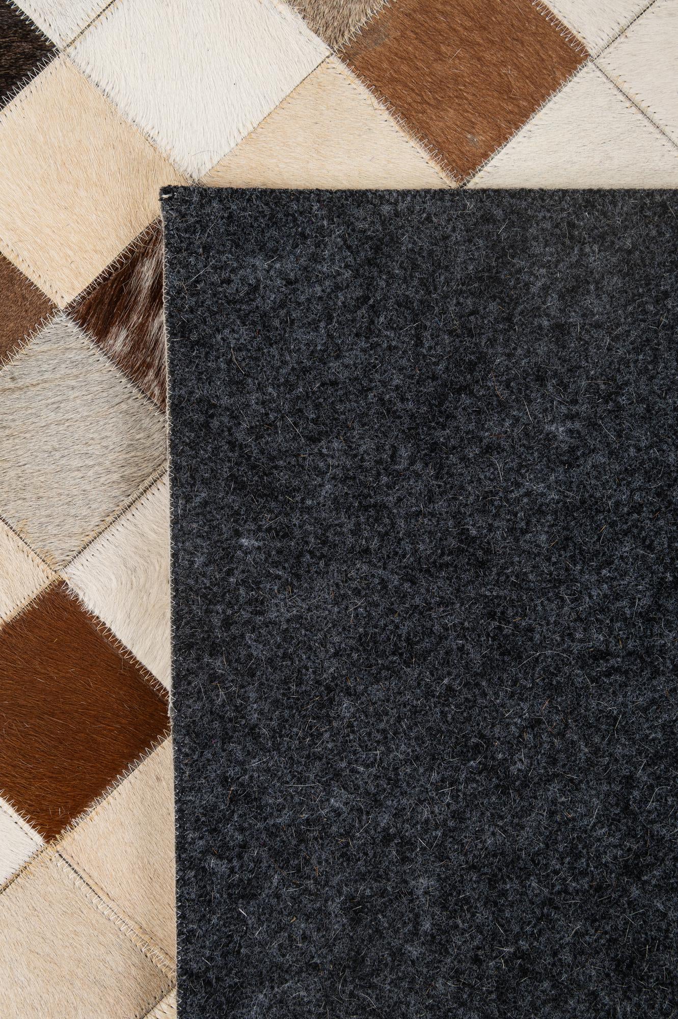 5' 1 x 7' 10 Cowhide - Patchwork Rug
