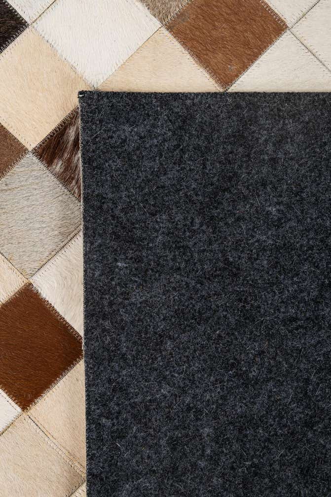 5' 1 x 7' 10 Cowhide - Patchwork Rug