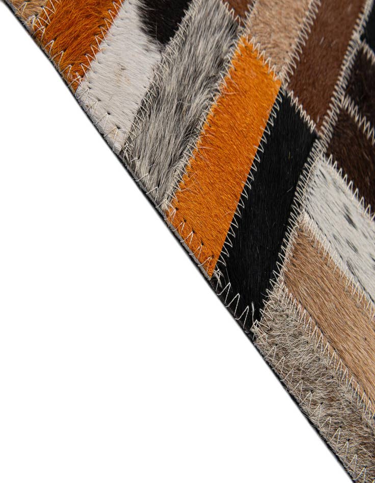 Detail image of 5' 1 x 8' Cowhide - Patchwork Rug