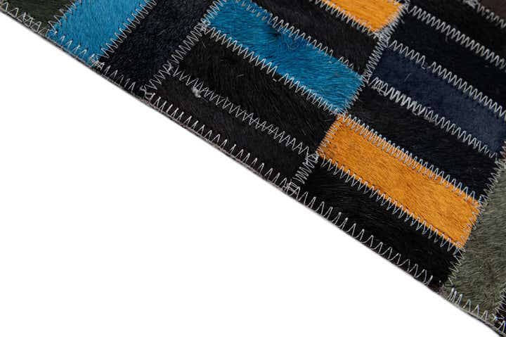 4' 11 x 8' Cowhide - Patchwork Rug