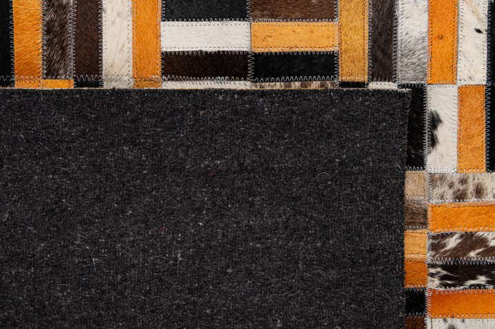 4' 11 x 7' 11 Cowhide - Patchwork Rug