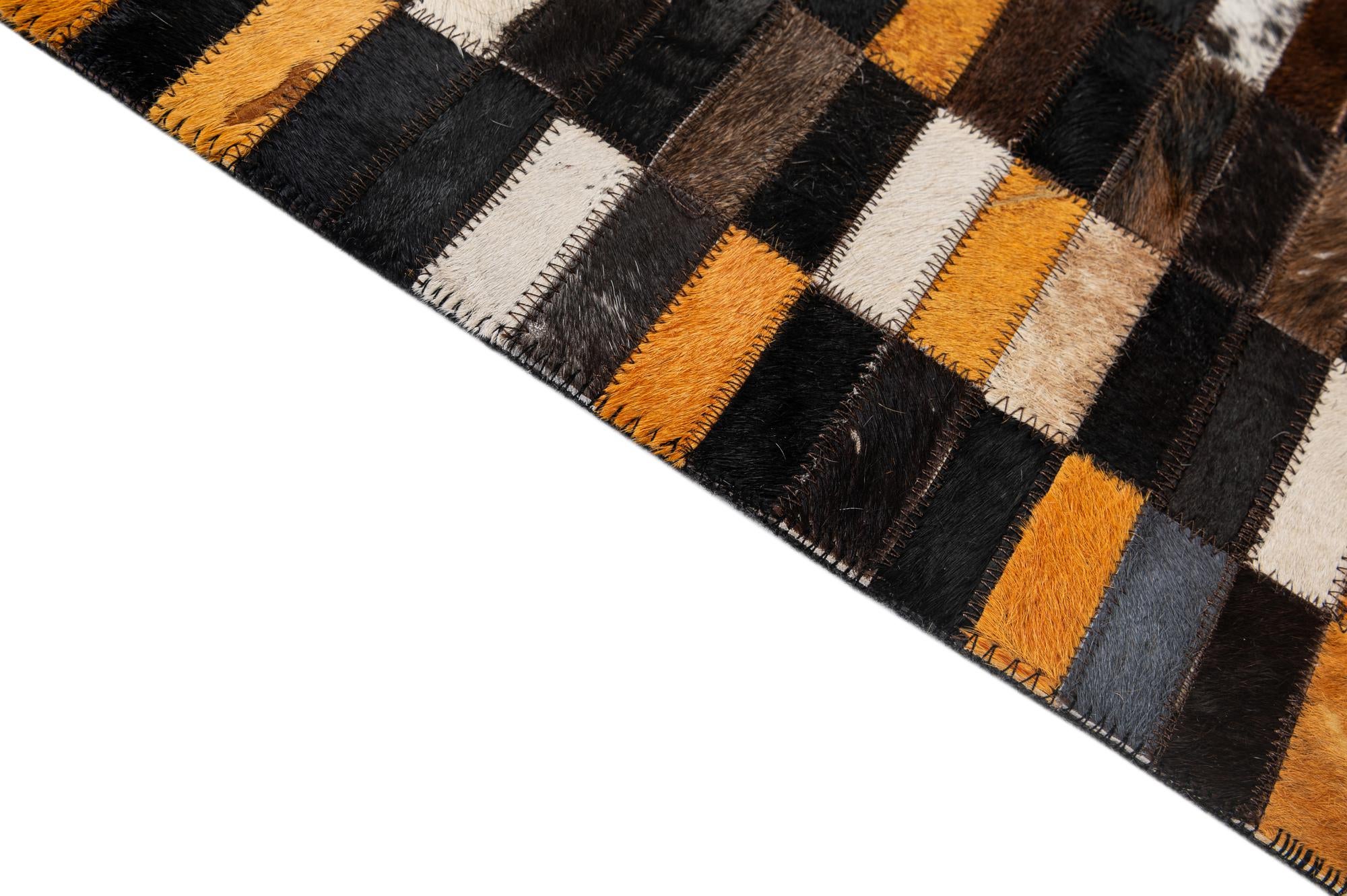 5' 3 x 8' 1 Cowhide - Patchwork Rug