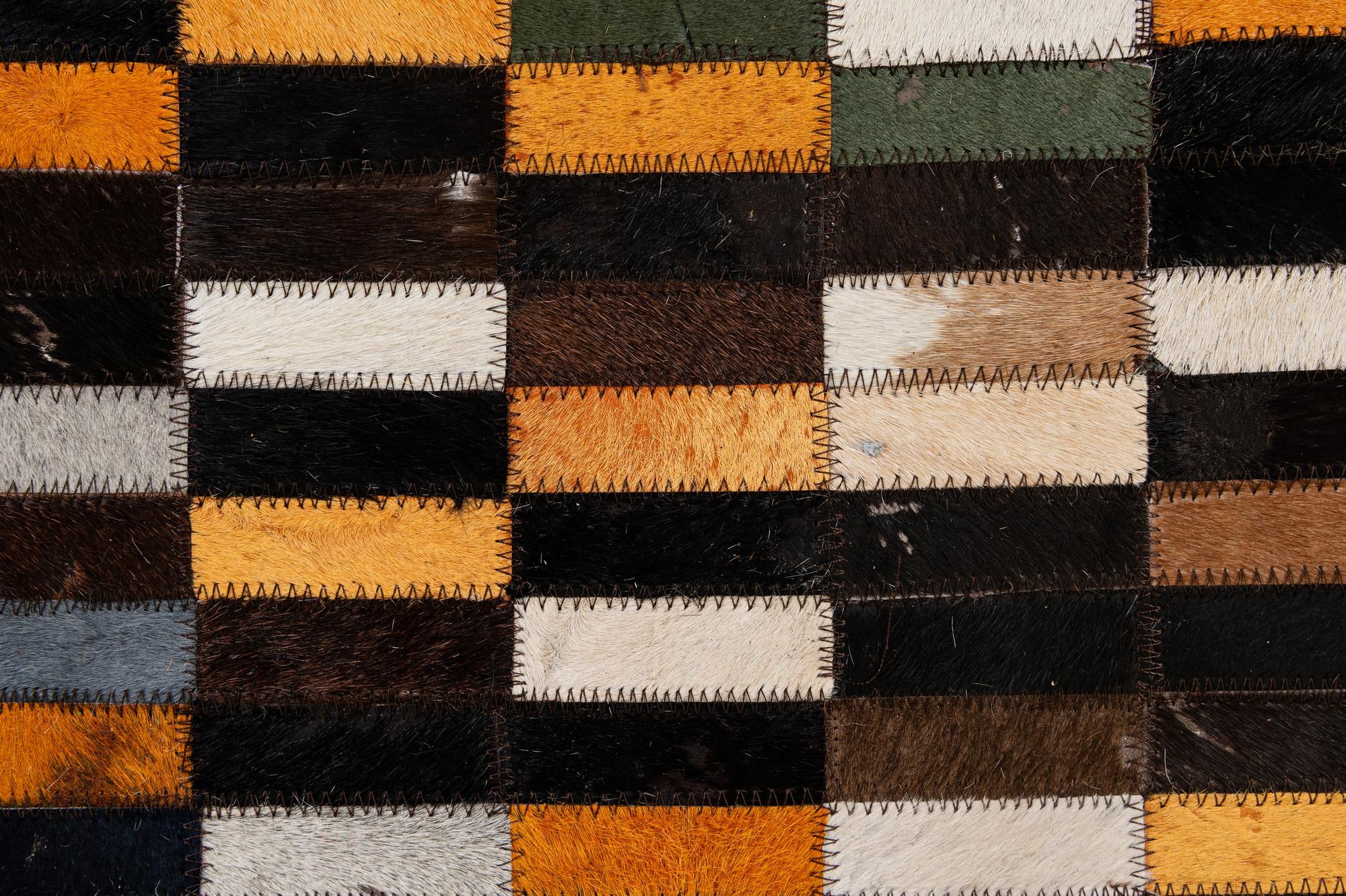 5' 3 x 8' 1 Cowhide - Patchwork Rug