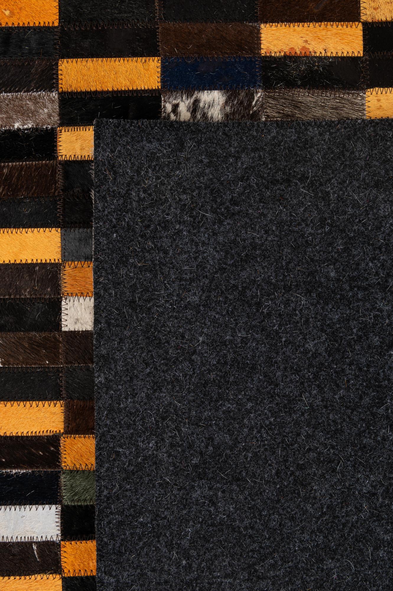 5' 3 x 8' 1 Cowhide - Patchwork Rug