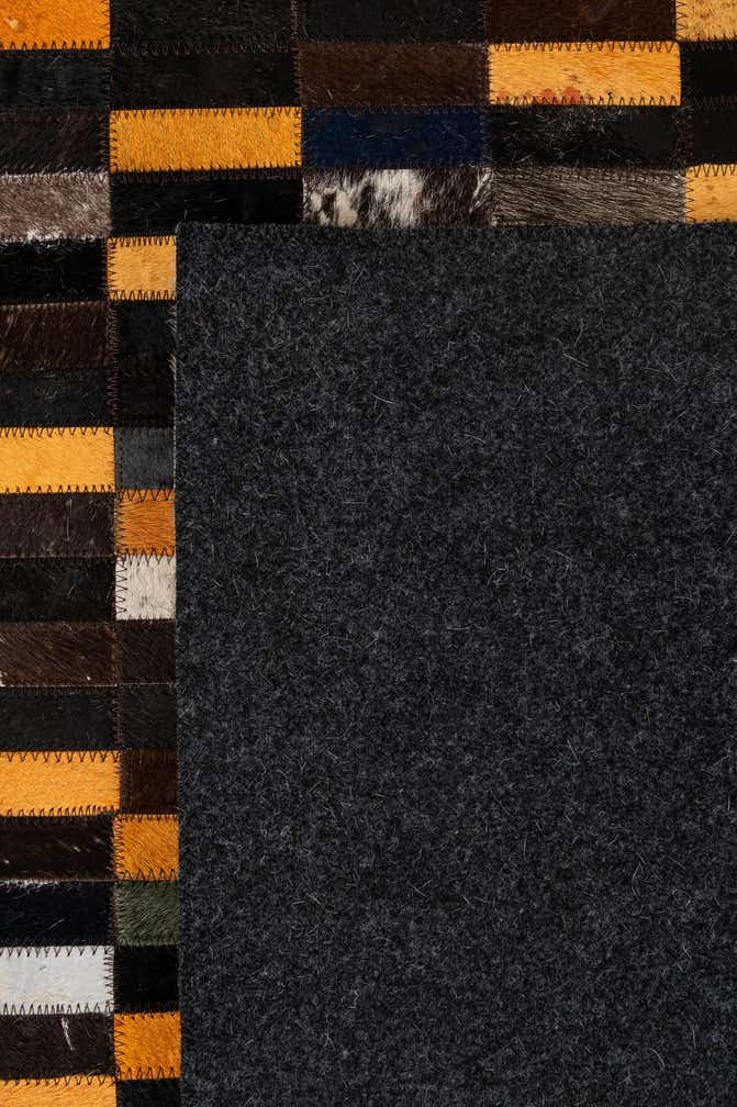 5' 3 x 8' 1 Cowhide - Patchwork Rug
