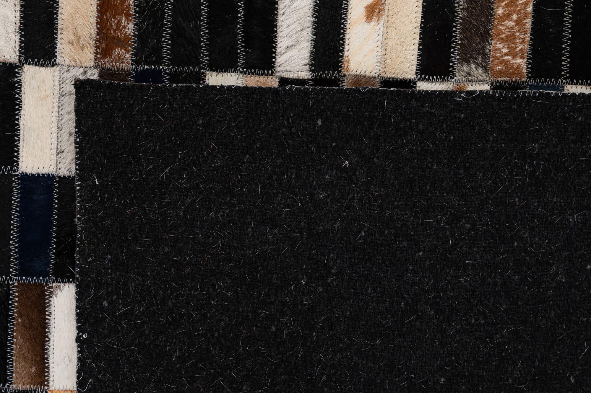 4' 11 x 7' 11 Cowhide - Patchwork Rug
