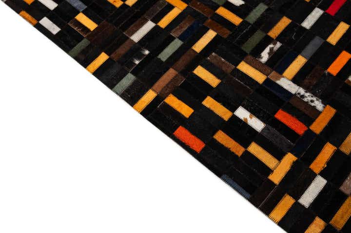 4' 11 x 7' 10 Cowhide - Patchwork Rug