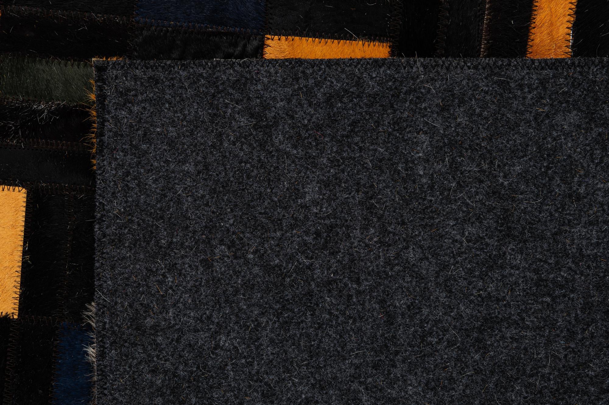 4' 11 x 7' 10 Cowhide - Patchwork Rug