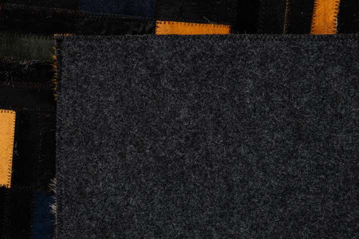 4' 11 x 7' 10 Cowhide - Patchwork Rug