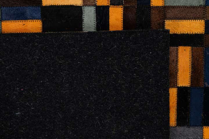 4' 11 x 7' 10 Cowhide - Patchwork Rug