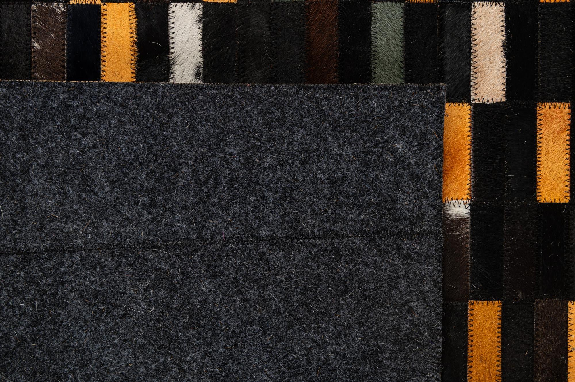 5' 2 x 8' 1 Cowhide - Patchwork Rug