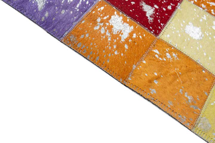 4' 11 x 7' 10 Cowhide - Patchwork Rug